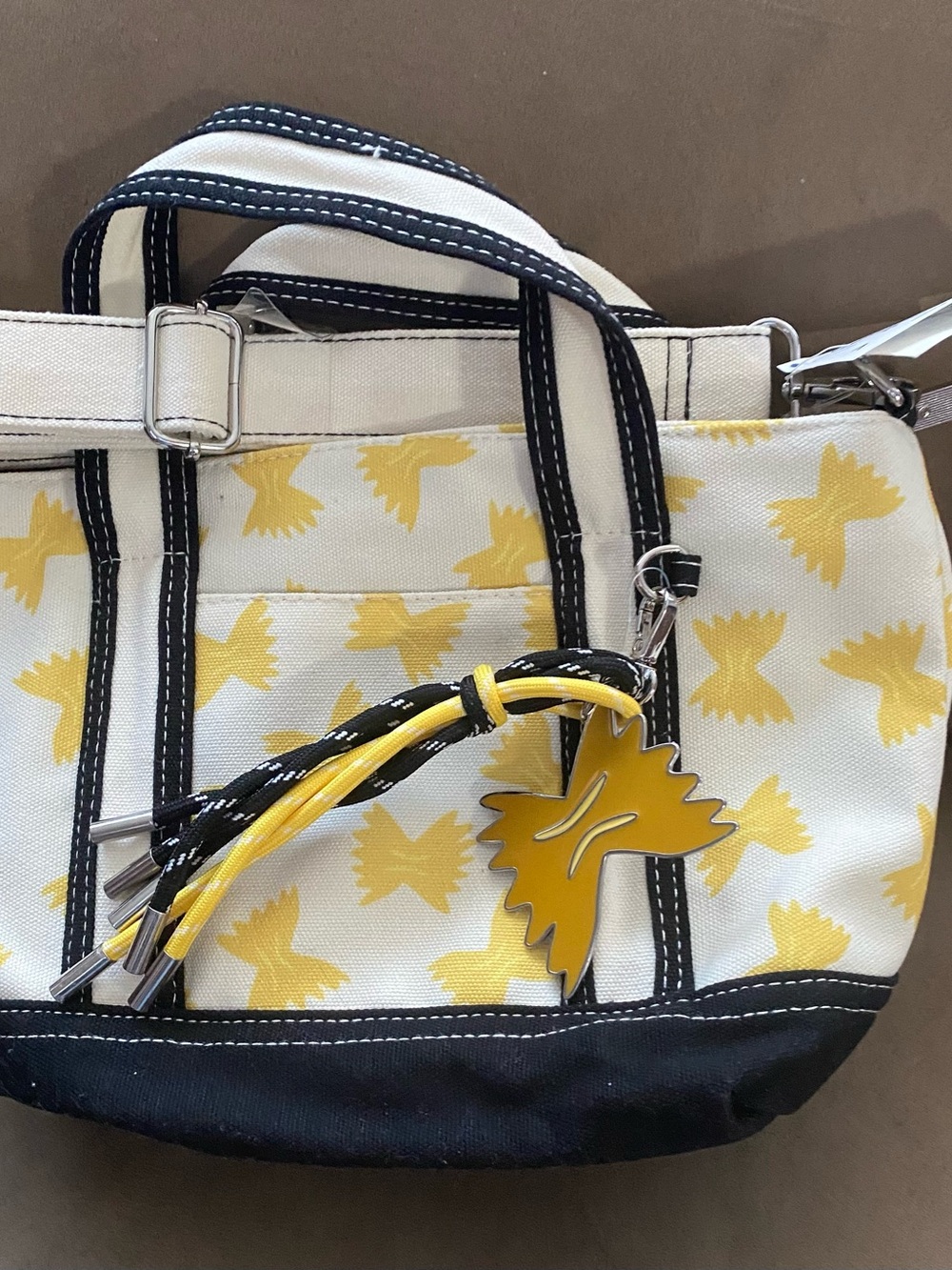 White and Yellow Patterned Crossbody Bag with Black Trim